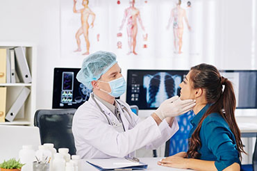 doctor-checking-glandes-of-patient-1024×682